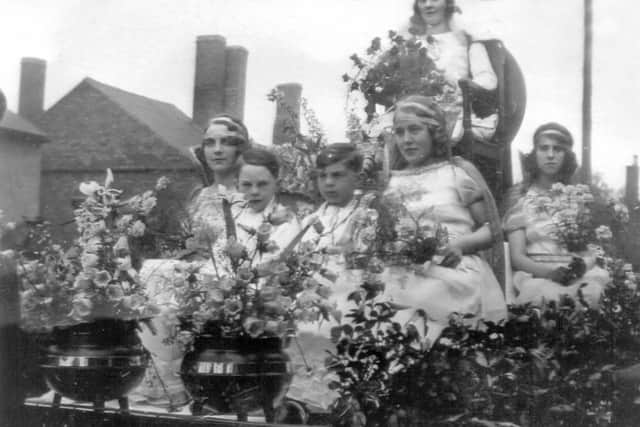 Teenage Ellen Taylor, left, as an attendant to carnival queen Gladys Price at the 1930 Lye carnival