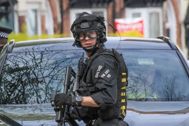One of the armed officers. Photo: SnapperSK