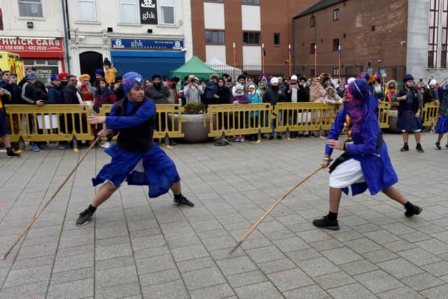 A demonstration of Gatka by two young members of the community