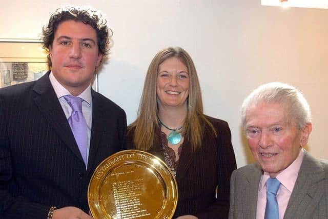 Claude and Claire Bosi receiving their award for Restaurant of the Year 2005 (Michael Stephens/PA)
