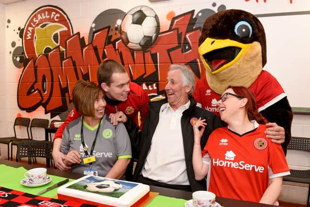 WALSALL COPYRIGHT EXPRESS&STAR TIM THURSFIELD- 05/03/20.Former Saddlers manager Chris Nicholl who has dementia, officially opened the dementia cafe at Walsall FC, which will be based in the community room..He is pictured joking with Pat Roberts and Claire Whittaker, both from Accord, and Chris Springthorpe, health officer at Walsall FC..