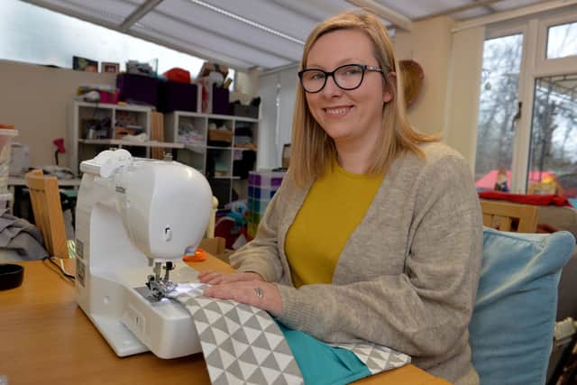 Katy at work on her sewing machine 