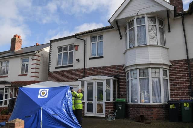 A blue tent was erected outside the house. Image: @SnapperSK