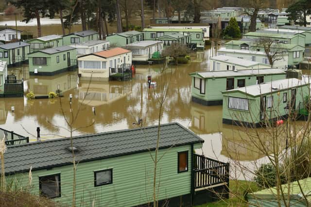 The Riverside Caravan Park Houses surrounded by flood water in Bridgnorth