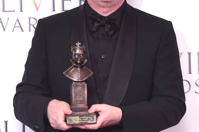 Matthew Bourne wins the Special Award presented by Darcy Bussell and Richard E Grant at the Olivier Awards at the Royal Albert Hall in London