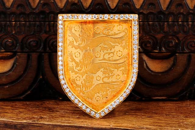 The England brooch was owned by former Baggies chairman Sir Frederick Albert Millichip