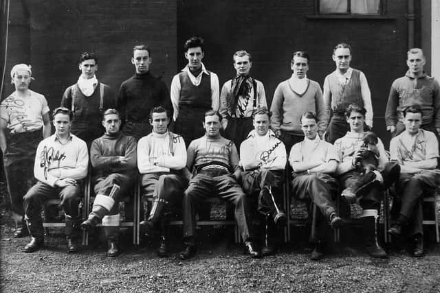 John Shanks is bottom row, third from right, in this photo which may have been taken while he was a prisoner at Stalag VIIIb, although that is not confirmed
