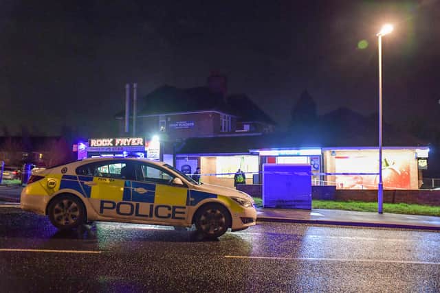 Police outside McColl's and the Rock Fryer. Photo: SnapperSK