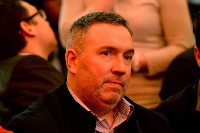 Conservative deputy council leader Adrian Andrew called Labour's Sean Coughlan 'a disgrace'