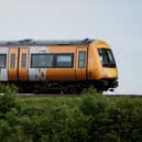 A West Midlands Railway train passing through Shifnal
