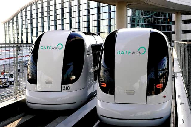 Could driverless vehicles, like these shuttle pods at Heathrow Airport, be used to transport visitors between Dudley Zoo, Black Country Living Museum and Dudley Canal Tunnels?