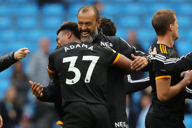 Trust in each other: Nuno Espirito Santo with Traore (AMA)