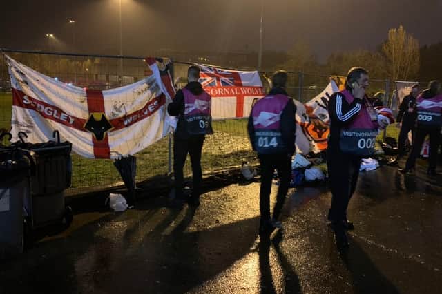 Wolves stewards tried to retrieve flags which were confiscated outside the ground