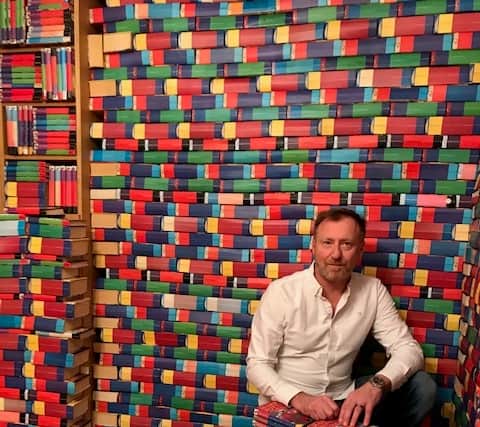 Mark Cavoto with some of his 1,500 Harry Potter books. Photo: Emma Errington/Hansons