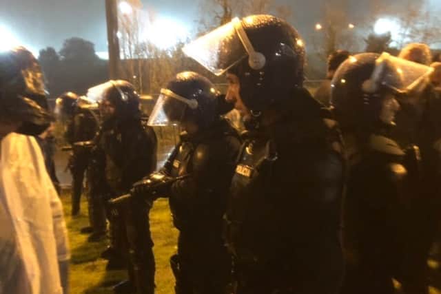 Police dressed in riot gear were herding Wolves fans