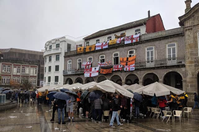 Wolves fans in a wet Braga ahead of Wolves' Europa League match