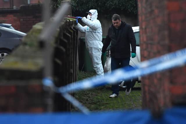 The search continues ion the garden area of the Stafford property. Credit: Jacob King/PA Wire