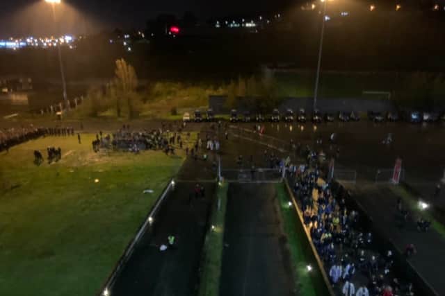Wolves fans were forced to wait in a field after the match had kicked off. Photo: Lee Tompson