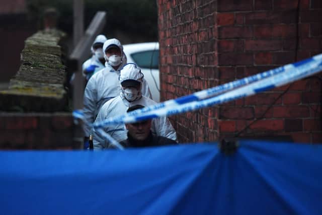 The forensic search team arrive at the flat in Wolverhampton Road, Stafford, yesterday. Credit: Jacob King/PA Wire