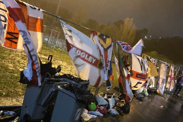 Wolves stewards hung up flags they retrieved from bins after they were confiscated by local security