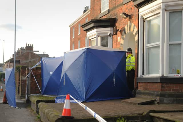 The gflats remained cordoned off on Sunday as the terrorism investigation continued