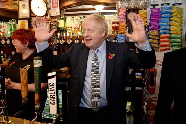 Mr Johnson in the Lych Gate Tavern in Wolverhampton where he pulled a pint