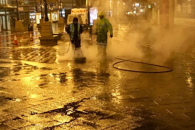 Contractors carry out a pressure wash of Park Street in Walsall town centre. PIC: Gurdip Thandi LDR