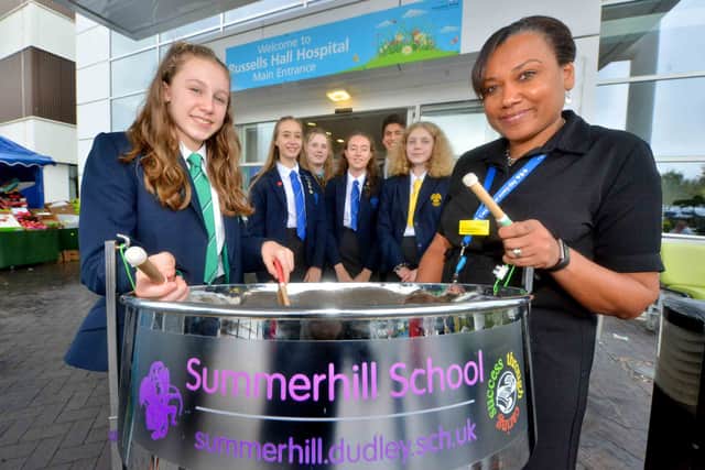 Student Grace and deputy chief nurse Carol Love-Mecrow, with Summerhill pupils Fanni, Hannah, Grace, Ethan and Emelia at Russells Hall Hospital