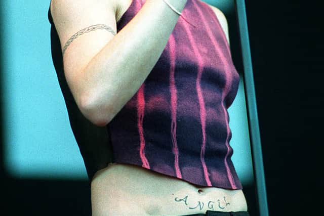Mel C performing at Weston Park in 1999 when she sported a radical new image.