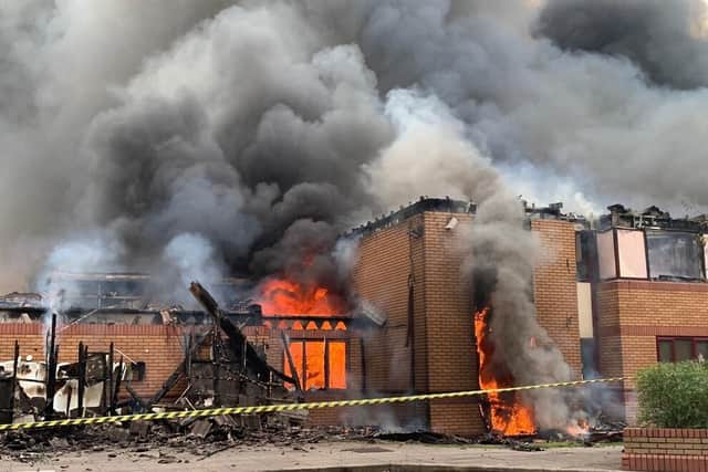 The hotel on fire. Photo: John Kennett/WMFS