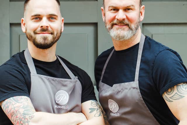 The chef (right) works with a strong team