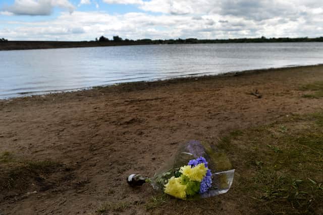 A floral tribute left at the scene of the tragedy 
