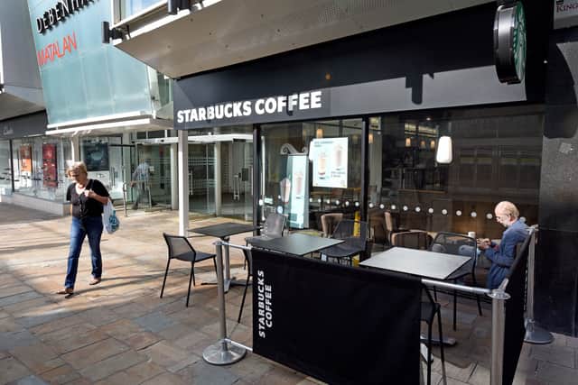 Starbucks' outlet on the entrance to Mander Centre 