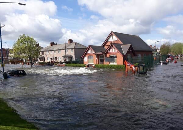 Ten million litres of water swept through the street outside Lea Brook Methodist Church in April 2018