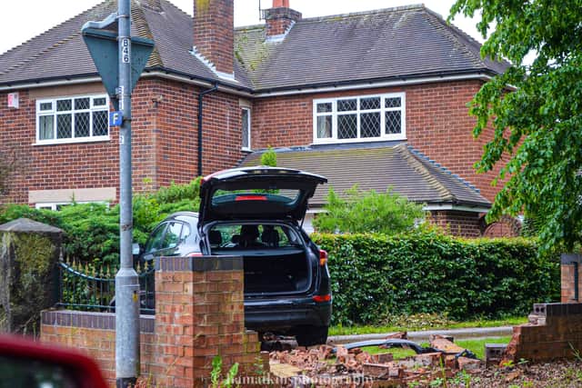 The Hyundai went through a wall and ended up in a hedge. Photo: Liam Atkins