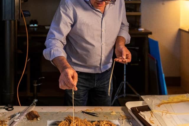 Food artist Carl Warner and his team creating the piece