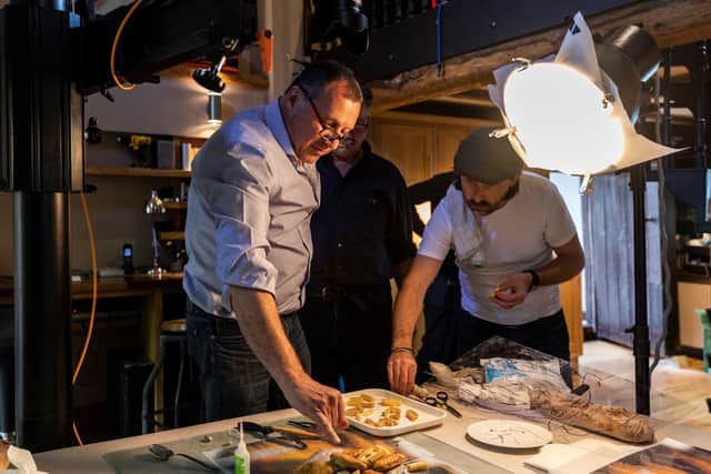 Food artist Carl Warner and his team creating the piece