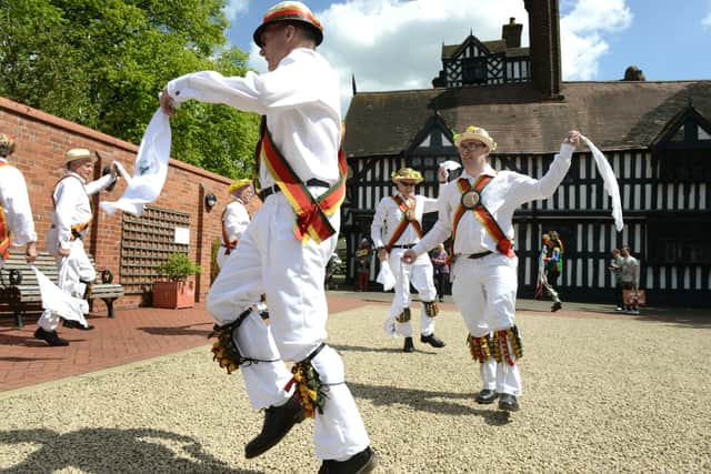 The 1st Sedgley Morris dancers performing at the Green Man Festival at Oak House Museum