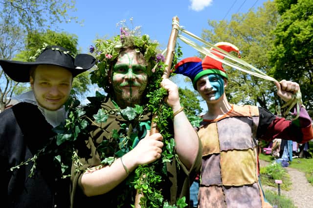Liam Lauf, Jimi Lauf and Tyler Lauf entertain the crowds at the Green Man Festival at Oak House Museum, Oak Road, West Bromwich