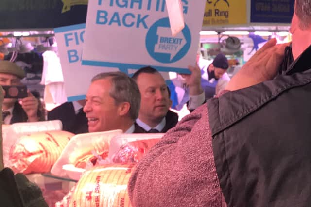 He had a good laugh with business owners on his walk about the city