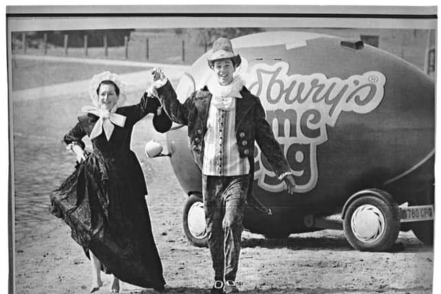 May 1, 1990: Show at the National Exhibition Centre about the new Cadbury World tourist centre. Photograph shows Maria Cadbury, alias Francis Land, and Steve Johnstone arriving in a large Cadbury World Creme Egg on wheels.
