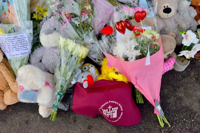 Flowers and toys left at the scene