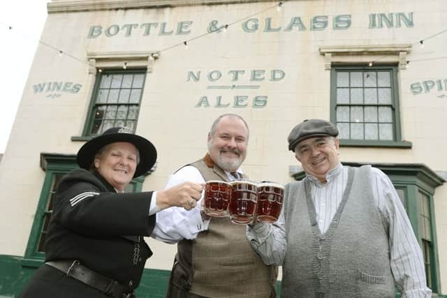 Carole Davies, Kevin Goodman and Gregory Dunn in the Bottle and Glass Inn at the Black Country Living Museum, Dudley as they look forward to a busy 2019