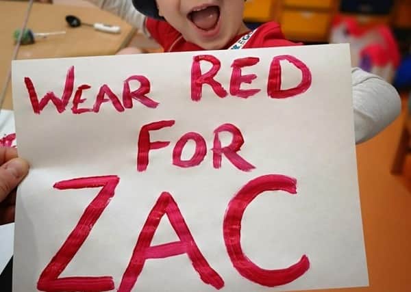 Wear red for Zac