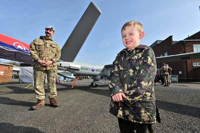 Ace Plant, aged five, came dressed up for the event. He is pictured with Lance Bombadier: Daniel Frewen from South Wales.