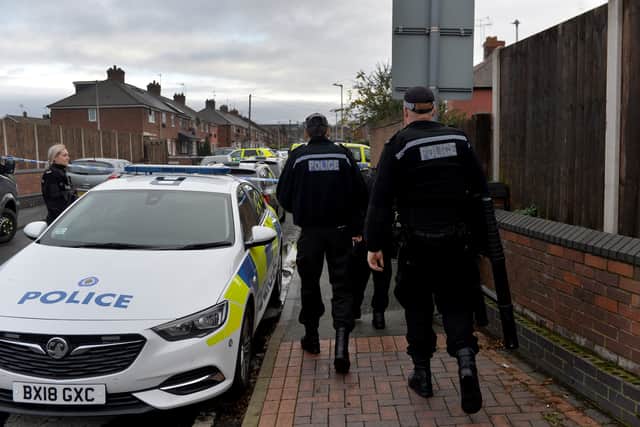 Police at the scene in West Bromwich