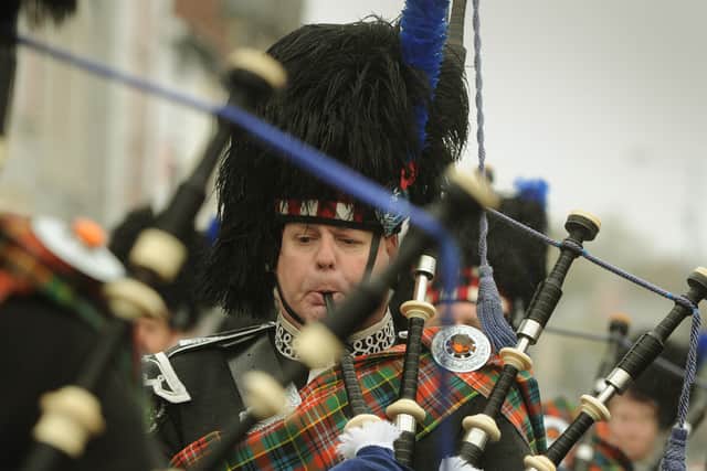 A bagpiper during the parade