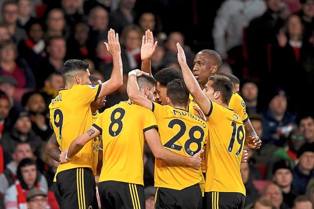 Wolves celebrate taking the lead during an excellent performance against Arsenal (AMA)