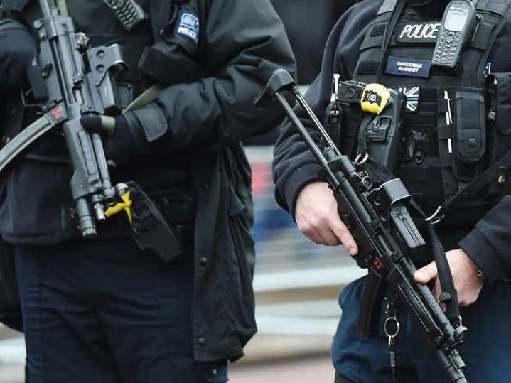 Men arrested after threatening armed police in car with crowbar