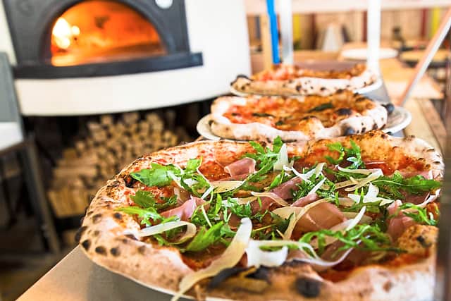 Spend your dough on these – a line-up of Baked in Brick’s delicious pizzas